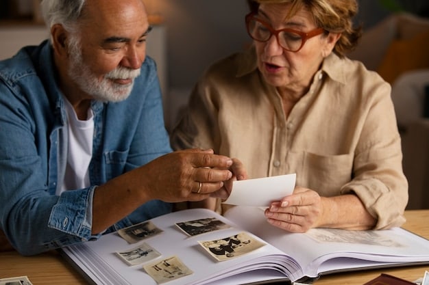 Two people looking at old photos together, smiling and laughing. The photos are spread out on a table, and they are pointing and reminiscing about the memories captured in the pictures. The image focuses on nostalgia and shared history.