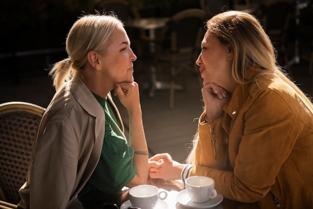 Two people engaged in a deep conversation at a coffee shop, showing focused attention and genuine listening.