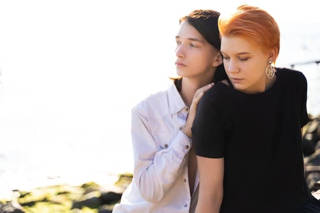 Two friends having a serious conversation, one comforting the other with a hand on their shoulder.