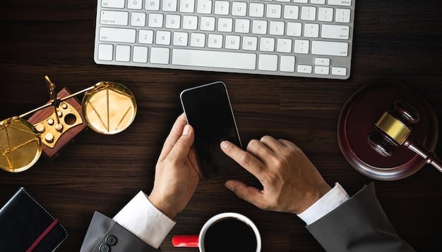 A gavel resting on a smartphone screen displaying various social media icons. The gavel symbolizes the legal aspects, while the phone represents the platforms. The background is blurred, focusing attention on the foreground elements.