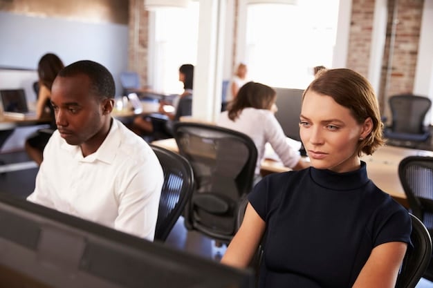 A diverse team of customer service representatives working at computers, collaborating to provide quick and efficient responses to social media inquiries, emphasizing teamwork and technology.