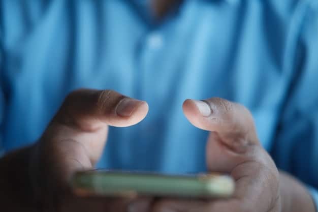 A close-up of a hand using a smartphone to navigate social media settings. The focus is on the unfollow button, with options to mute or restrict visible.