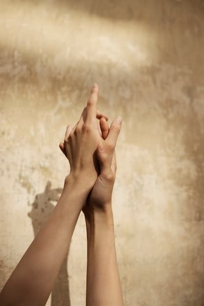 A close-up shot of two hands gently holding each other, symbolizing empathy and connection. Soft focus, warm colors emphasizing comfort and understanding.