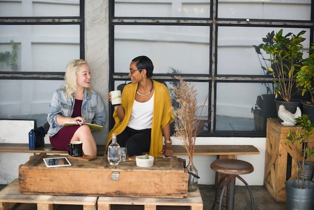 Two people are sitting across from each other at a table in a coffee shop, deeply engaged in a conversation. One person is actively listening with a supportive expression, while the other is speaking with genuine emotion. The scene captures the essence of empathetic communication and connection.
