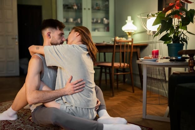 A couple embracing in their living room, looking relaxed and content, showcasing a secure and loving relationship.