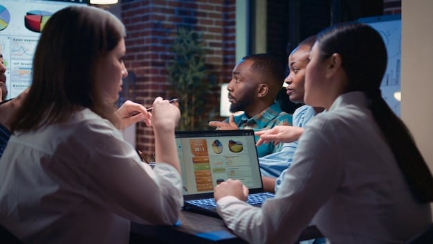 A diverse group of people engaged in a thoughtful discussion, with data visualization screens in the background, symbolizing informed decision-making and collaborative risk assessment.