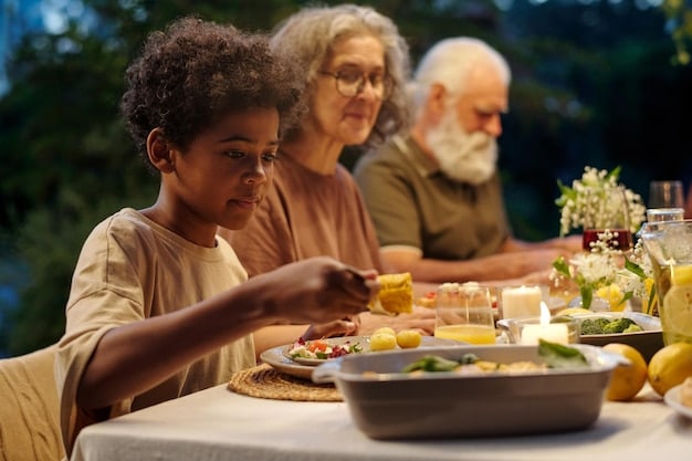 A multi-generational family (grandparents, parents, children) sharing a meal at a large table, showing warmth and connection, symbolizing strong family ties in some collective-leaning communities within the US.