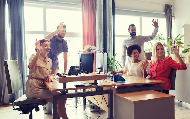 A diverse group of colleagues playfully exchanging jokes in an office setting, illustrating a relaxed and connected atmosphere.