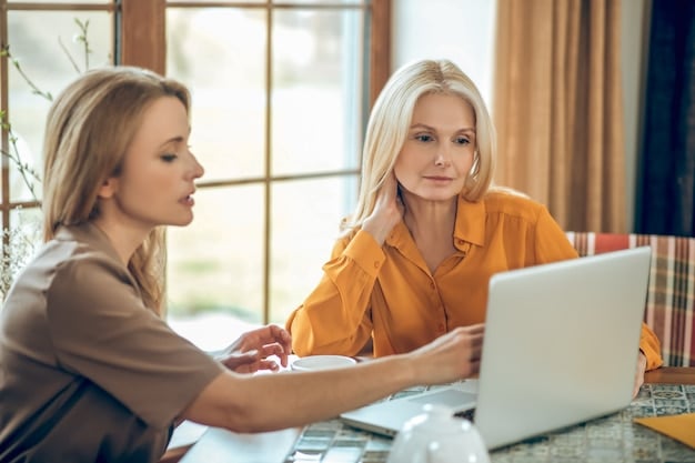 A professional looking woman, mid-30s, giving specific, constructive feedback to a younger colleague in a brightly lit office setting, emphasizing clear communication and mutual respect.