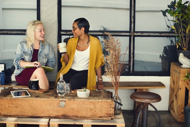 A diverse group of US professionals engaged in flexible work arrangements, some working in cafes, others at home with children, illustrating the concept of work-life integration rather than strict separation.