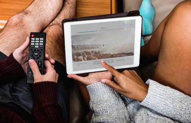 A close-up shot of a pair of hands using a screen reader device to navigate a website on a laptop, with Braille text slightly visible on the screen. The user has a focused, determined expression, highlighting the importance of clear audio feedback.